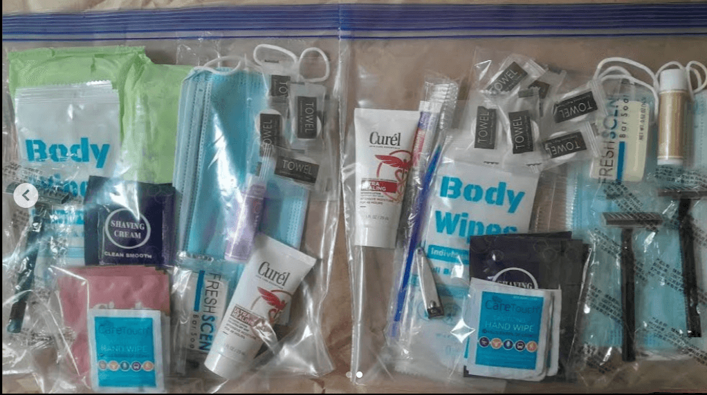  Detailed view of hygiene kits with body wipes, toothbrushes, shaving cream, and other essential items